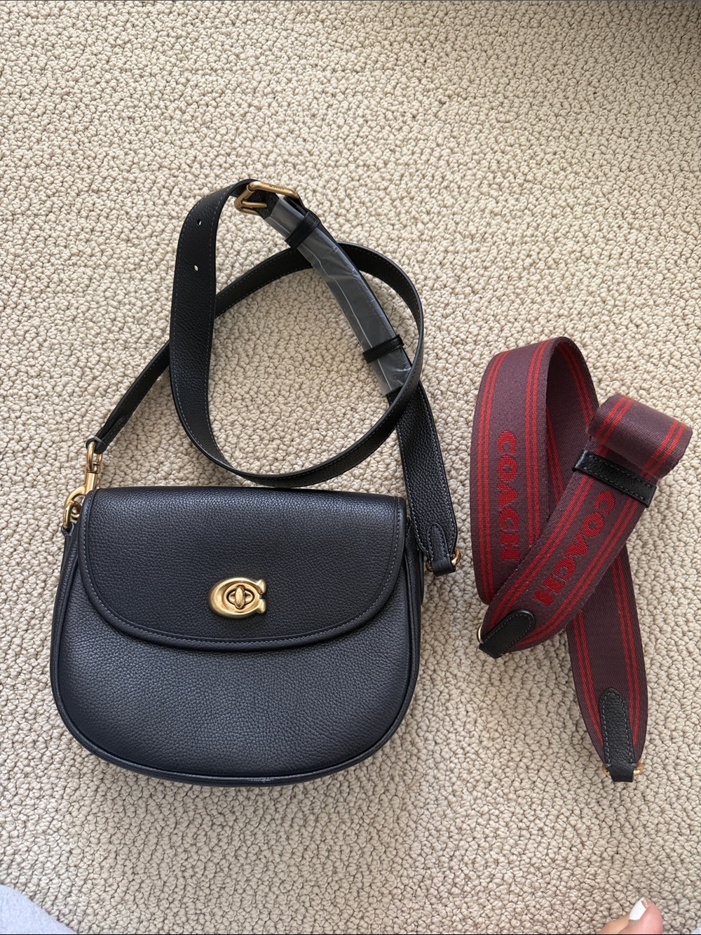 Coach Black Pebbled Leather Saddle Crossbody with Red Strap